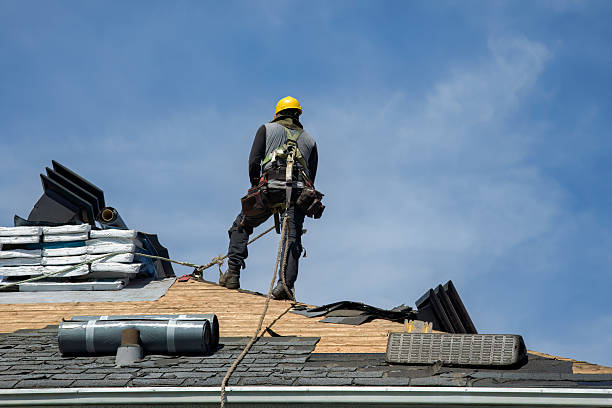 Professional Gutter Installation technician working in Alkol, WV